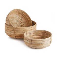 three woven baskets with handles on white background