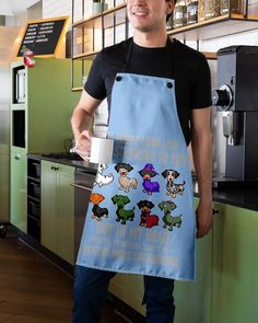 a man in an apron holding a coffee cup