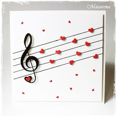 a card with music notes and hearts on it