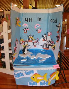 an ice rink with penguins on it and the words h is cool written in large letters