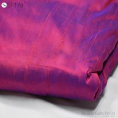 Iridescent Red Blue Pure Dupioni Silk Fabric by Yard Red Wedding  Raw Silk Dupion Crafting Sewing Dress Bridesmaid Prom Dresses Indian ➤Color: Iridescent Red and Blue  ➤Quality: The fabric is 100% dupioni silk of the highest grade. (100gsm) ➤Width: 44 inches  ➤Listing for 1 Yard of fabric. ➤Code: sf178 This iridescent silk dupioni fabric has a brilliant sheen and cross threads of Red and Blue. The Dual tone of both colors is evident under different lighting and angles, though Red is very visible in the fabric with strong undertone sheen of Blue is always reflected. The Blue warp provides superb depth to the color of this silk, producing a gorgeous jewel tone look. As all silk fabrics color and reflection change under different light conditions. Tends to be milder in color under natural lig Wedding Bridesmaid Dresses Indian, Bridesmaid Dresses Indian, Dupioni Silk Fabric, Sewing Upholstery, Indian Colours, Sewing Wedding Dress, Silk Dupioni, Sewing Dress, Raw Silk Fabric