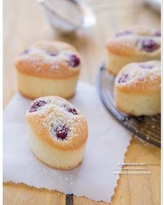 small pastries with powdered sugar on top