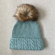 This adult sized winter hat is a super cozy accessory for the cold weather. The cabled brim and the 1x1 ribbing make the hat slightly thicker than a standard knit hat and will also fit more snugly. The hat is knit from the brim up and is knit inside out. When the hat is completed, just flip it inside out and fold the brim up, that way the cables will be on the outside. I included both a chart and written instructions for the cabled brim portion and a description of the cable stitches are listed Simple Knitted Hat, Basic Knit Hat Pattern Free, Knit Winter Hat Pattern, Cable Knit Hat Pattern, Cable Knit Hat, Cozy Accessories, Cable Stitch, Knit Hats, Hat Knitting Patterns