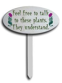 a sign that says, feel free to talk to these plants they understand't