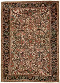 an antique persian rug with red, green and blue colors on the center area is shown