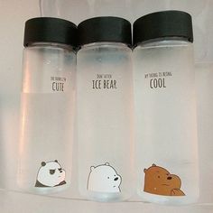 three water bottles with different animals on them