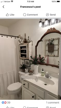 a bathroom with a white toilet and sink