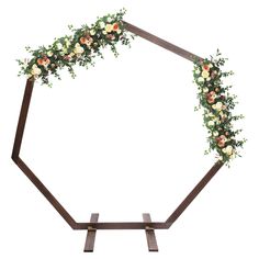 a wooden arch with flowers and greenery on the top is isolated against a white background