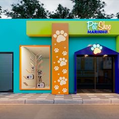 the front entrance to a pet shop with paw prints on it