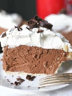 a piece of chocolate pie on a plate with a fork