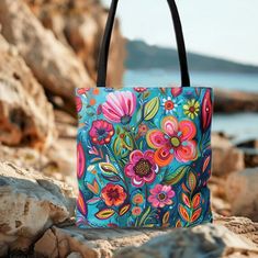 Colorful Flower Bag For Summer Accessories For Women Tote Bag Hippie Tote Bag Canvas Boho Tote Bag Birthday Gift Turquoise Pink Orange Tote. This practical and high-quality bag is the perfect blend of comfort and style, whether you're strolling along the beach or exploring the vibrant streets of town. 𝐃𝐄𝐓𝐀𝐈𝐋𝐒 🌺 100% Polyester 🌺 Boxed corners 🌺 Black inner stitching, transparent thread on hems. 🌺 Red cotton handles 🌺 With non-woven laminate inside 🌺 3 sizes: Small ( 12'x13'), Medium Light Blue Rectangular Shoulder Bag As Gift, Blue Large Capacity Shoulder Bag As Gift, Multicolor Shoulder Bag For Gift, Light Blue Rectangular Shoulder Bag For Gift, Blue Shoulder Bag With Large Capacity As Gift, Large Capacity Blue Shoulder Bag For Gift, Blue Shoulder Bag For Gift, Colorful Tote Bag For Gifts, Colorful Pouch Bag For Gift