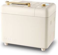 a white ice chest sitting on top of a table