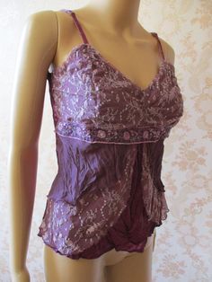 "Vintage lacy top, boho style. This lovely top is a purple scrunch fabric with a lace overlay with embroidered flower pattern and sequins. It has a V neck and bra straps. Bust;  32\"  it has some stretch Length;  21\" Made by NEXT" Fitted Bohemian Party Tops, Fitted Bohemian Tops For Party, Party Cami Top With Delicate Lace, Fitted Pink Top With Delicate Lace, Fitted Pink Delicate Lace Top, Delicate Lace Cami Top For Party, Pink Lace Top For Party, Fitted Tops With Lace Bodice And Spaghetti Straps, Fitted Lace Bodice Top With Spaghetti Straps