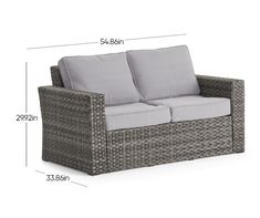 the measurements for an outdoor loveseat with grey cushions and gray cushioning on it