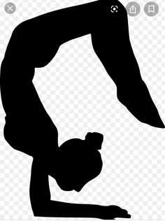 a person doing a handstand in the air with their legs crossed and one hand on