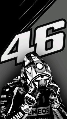 a man riding skis on top of a black and white background with the number 46