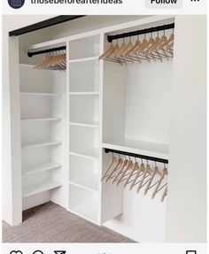 a white closet with wooden clothes hangers on the wall and two rows of shelves