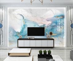 an elegant living room with marbled walls and white furniture, including a large tv