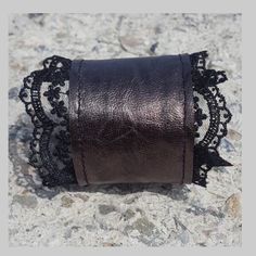 All items are handmade. They are created with love and soul especially for you! Extravagant and very modern jewelry inspired by urban style and fashion🤩 Material: 100% genuine leather Аnti-allergic metal without nickel content. The bracelet closes with a click button and its length from button to button is 20.5 cm. and wide 5 cm. 🎁Shipping🎁 🛬 STANDARD SHIPPING Europe : 6-8 business days USA&Canada : 8-10 business days Everywhere else :10-20 business days DHL EXPRESS SHIPPING Europe: 2-3 Handmade Black Cuff Bracelet For Festivals, Unique Brown Wrap Bracelet As Gift, Unique Brown Wrap Bracelet For Gift, Gothic Wristband Bracelet Gift, Brown Leather Bracelet For Party, Adjustable Brown Bracelets For Party, Handmade Black Spiritual Leather Bracelet, Elegant Brown Cuff Bracelet As Gift, Brown Steampunk Jewelry Gift