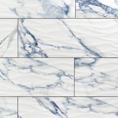 white and blue marble tiles with wavy lines