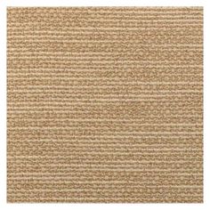 an image of a beige carpet textured with small brown dots on the top and bottom