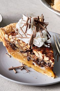 a slice of pie with whipped cream on top