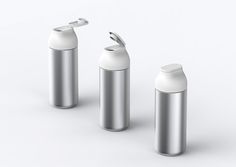 three stainless steel containers are shown with one empty bottle and the other half filled with something