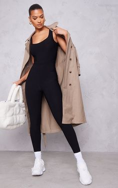 Jumpsuit And Trench Coat Outfit, Jersey Jumpsuit Outfit, Black Jumpsuit Airport Outfit, Jumpsuit With Trench Coat, Black Bodycon Jumpsuit Outfit, Jumpsuit Black Outfit, Black Jumpsuit Outfit Casual, Romper Outfit Ideas