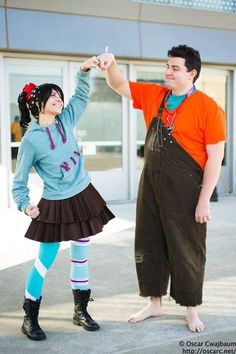 a man and woman are dressed up as characters from the animated movie wreckin't he girl