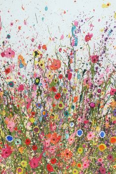 an abstract painting of colorful flowers and grass