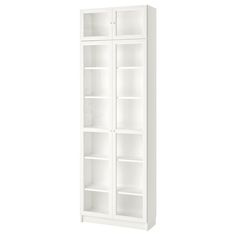 a tall white bookcase with two shelves on each side and one door open to reveal the