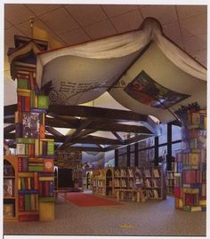 the interior of a library with books on display