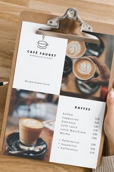 a person holding up a menu with coffees on it and the name cafe faucet