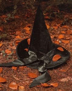 a black witches hat laying on the ground