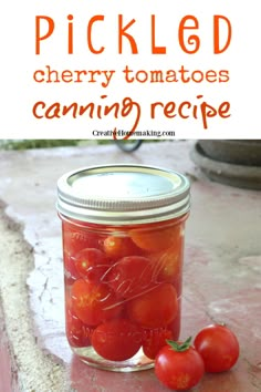 pickled cherry tomatoes in a mason jar with text overlay reading pickled cherry tomatoes, cherry tomatoes, and canning recipe