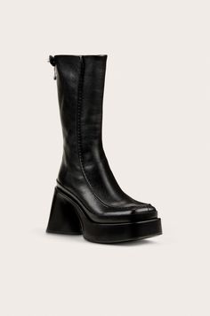 A mid-calf leather platform boot with a block heel and back zipper. — Mid-calf shaft height — Smooth leather — Platform — Back zipper — 4.7" heel height �— Runs small, we recommend sizing up Chunky Platform Boots, Icon Clothing, Platform Boots Chunky, Evening Flats, Sandal Platform, Swimming Bag, Boot Accessories, Kids Sandals, Chunky Platform