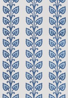 a blue and white wallpaper pattern with leaves on the bottom half of each leaf