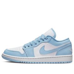 Whether you’re looking for a subtle, stylish addition to your wardrobe or are ready to make a statement with your footwear, the recently released Air Jordan 1 Low Aluminum is perfect! With homage to the alma mater of His Airness, the upper sports timeless University Blue and White shades that pay tribute to the University of North Carolina. Delicately crafted details include a delicious Jumpman on the tongue as well as iconic “Wings” embroidered onto the back heel, offering a premium touch. But it doesn't end there - Aluminum accents across throat and heel panels add an airy feel and cool complement to Navy underlining. Finally, outstanding traction provides superior grip while maintaining classic style. The Air Jordan 1 Low Aluminum offers an impeccable combination of modern technology an Wmns Air Jordan 1, Pretty Sneakers, Retro Basketball Shoes, Nike Fashion Shoes, Blue Jordans, White Shades, North Carolina Tar Heels, Nike Air Force Ones, University Of North Carolina