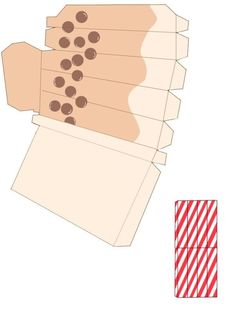 an open box with candy on it and a red striped paper towel next to it