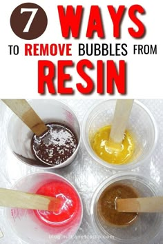 three plastic cups filled with different colored liquid and wooden sticks in them, the words 7 ways to remove bubbles from resin