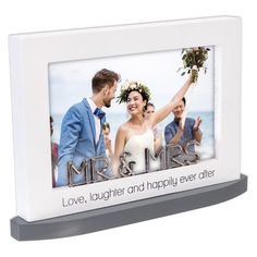 a wedding photo frame with the words love, laughter and happily ever after