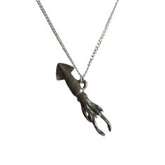 This sculpted pewter Squid Necklace, Loligo opalescens, is expertly designed into fashionable invertebrate calamari art, sure to delight tentacled cephalopod fans. 1inches long X .5 inches tall.(5 cm x 1.2 cm) 118 inch (45 cm) silvertone chain 12 inches (5 cm) extender chain 1Adjustable to 20 inches (51 cm) 1Secured with a lobster claw clasp Handmade necklace. Color viewing can differ with the browser and monitor used. Our sculpted pewter Squid Necklace is lovingly created. Afterward, it's store Black Obsidian Necklace, Anodized Aluminum Jewelry, Obsidian Necklace, Lion Necklace, Gold Circle Necklace, Karma Necklace, Aluminum Jewelry, Gold Chain Choker, Lovers Necklace