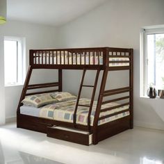 a bunk bed with drawers underneath it in a room next to two windows and a lamp