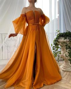 Details:-Organza fabric-Alloy orange color-Draped top with open skirt-For special occasions High Fashion Wedding Guest, Off The Shoulder Prom Dresses, Fashion Wedding Guest, Dresses High Fashion, High Fashion Wedding, 2022 Prom Dresses, Prom Dresses 2022, Cheap Prom Dresses Long, Organza Gowns