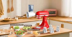 a red mixer sitting on top of a kitchen counter filled with different types of food