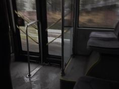 an empty seat on a bus with the door open to let people know where they are going