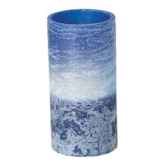 a blue and white vase sitting on top of a table