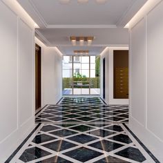 an empty hallway with black and white flooring