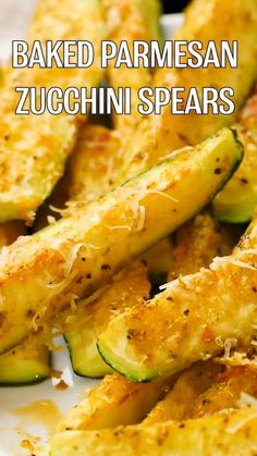 baked parmesan zucchini spears on a white plate with text overlay