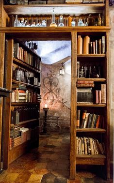 an open book shelf with many books on it